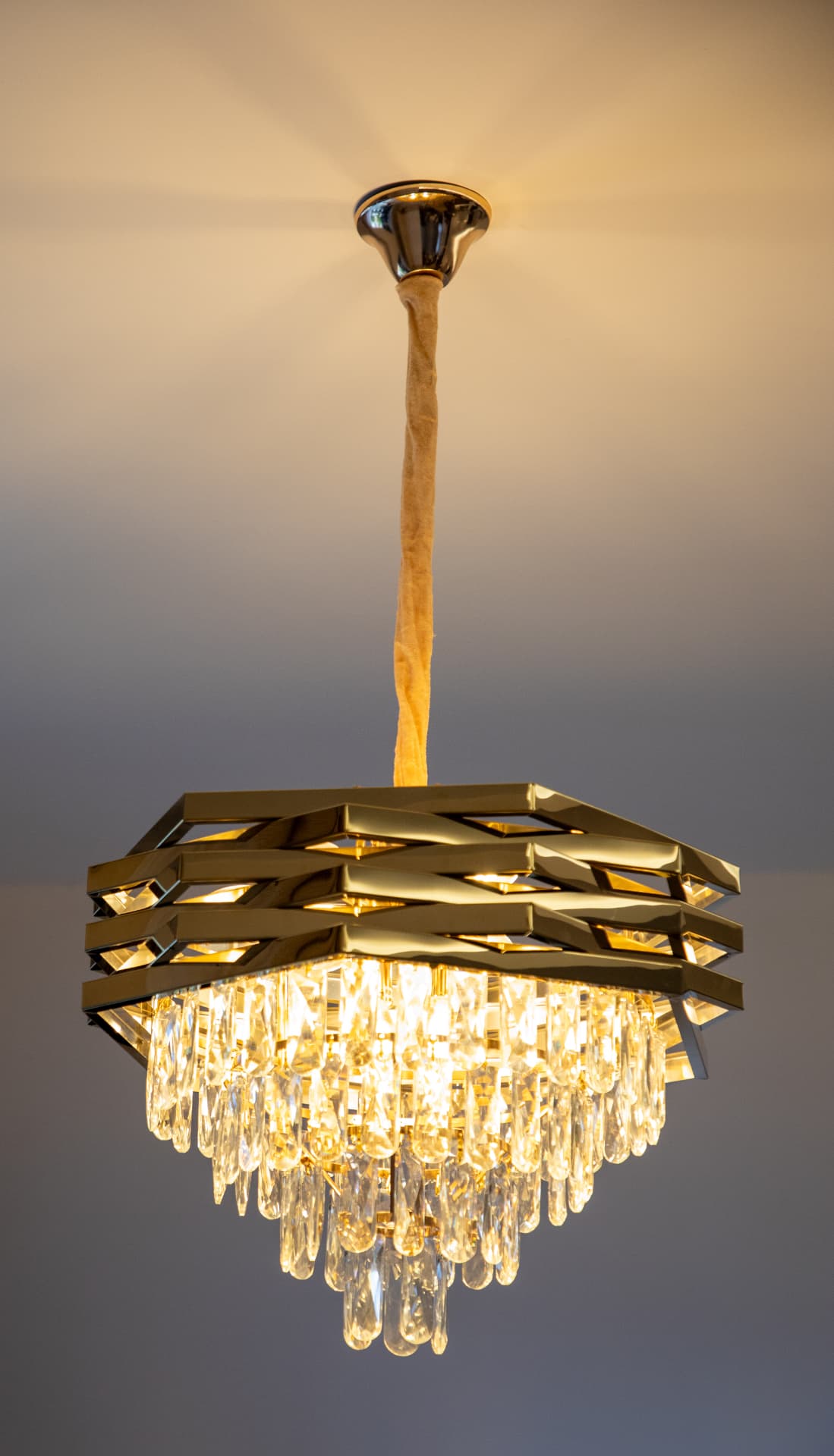 Gold crystal chandelier over the living room